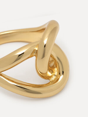 Ring Claire Knot. Two bands cross in perfect symmetry to create this simply stunning knot. Coated with a layer of 14K gol...