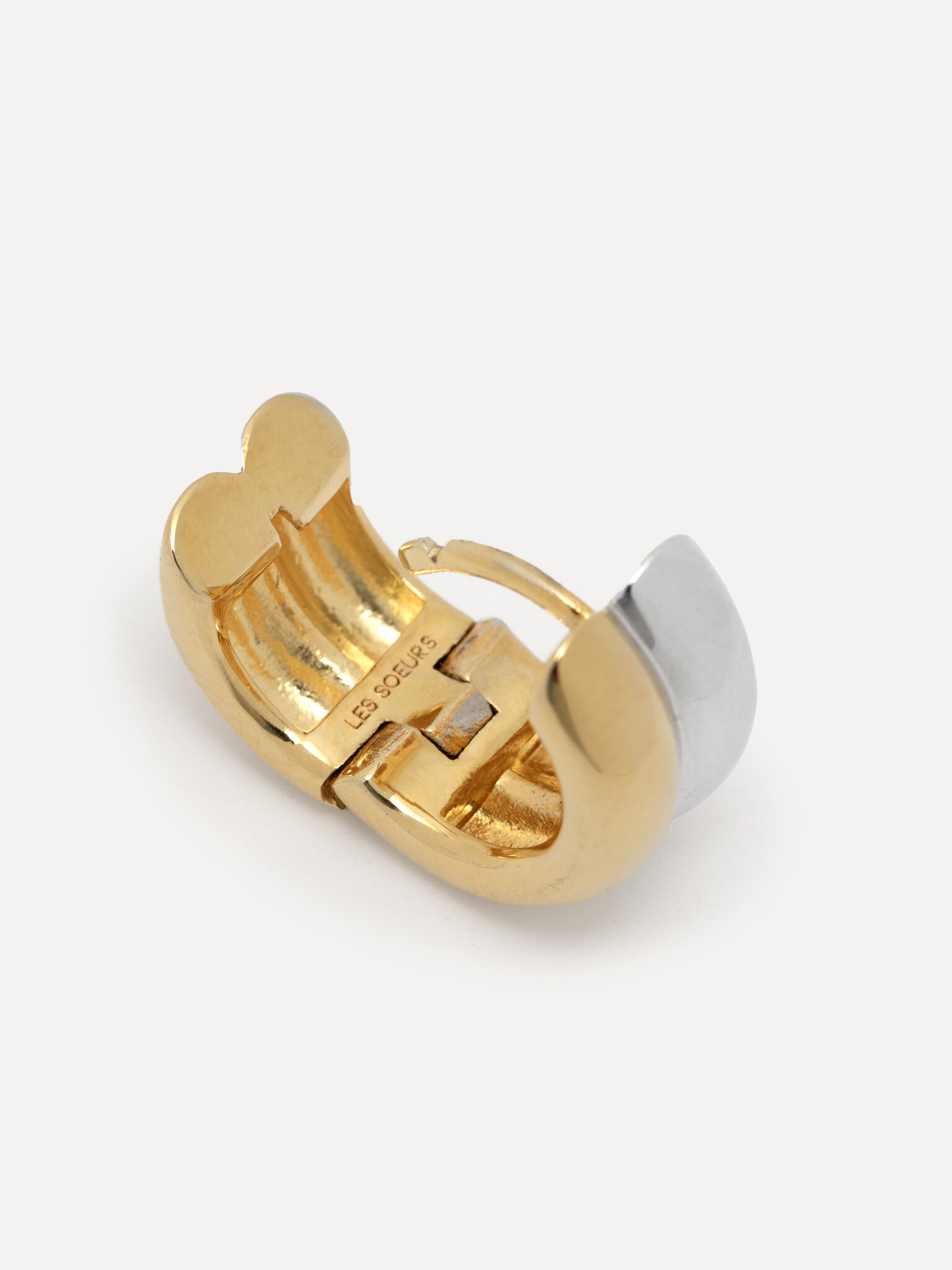 Les Soeurs Earring Ferdi Double Huggie 3. For the best of both worlds, try these huggie hoop earrings for a mixed metal m...