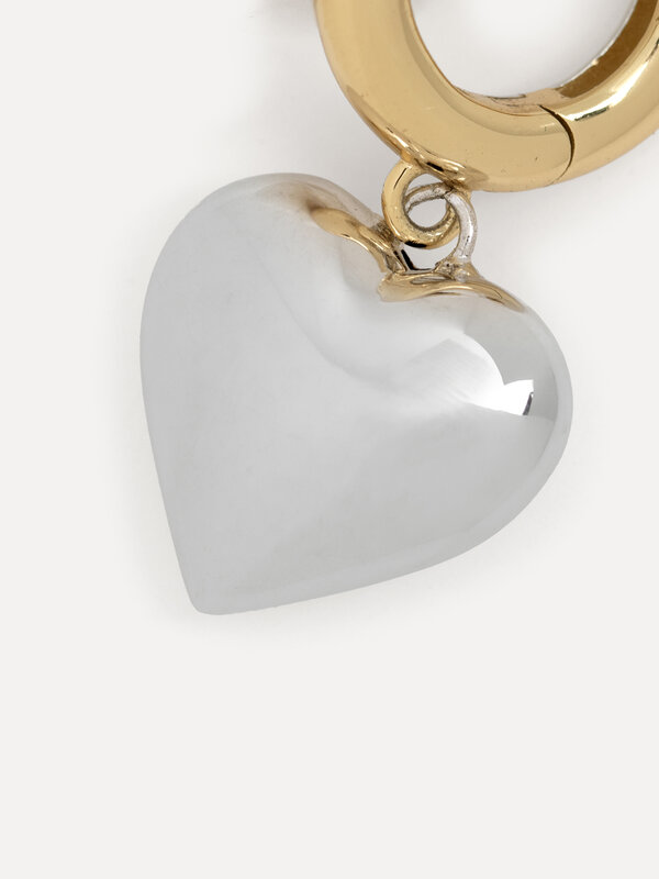 Les Soeurs Earring Jazz Heart 3. Wear your heart where others can see it. These Jazz heart earrings feature a chunky hoop...