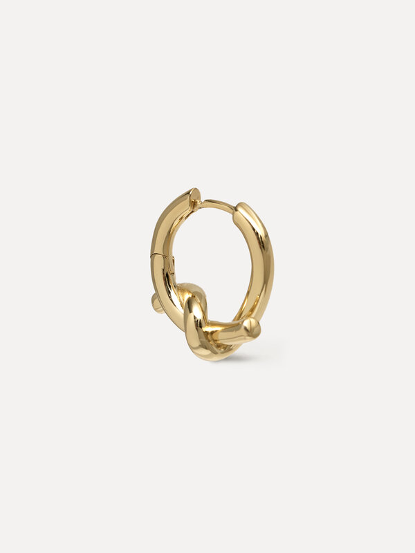 Les Soeurs Earring Jazz Knot 3. The perfect huggie earring with a subtle knot detail to complete the look. Easy to style ...