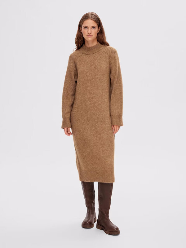 Selected Knitted midi dress Rena 2. The soft and comfortable knitted dress wraps you in coziness, while the high neck kee...