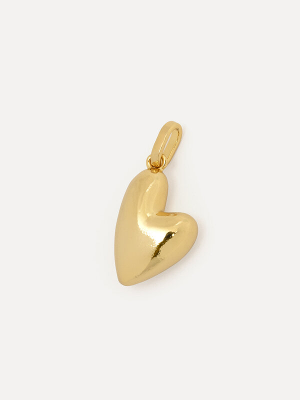 Les Soeurs Charm Heart 1. Create a timeless and loving look with this charm, a pendant in the shape of a heart. A warm, e...