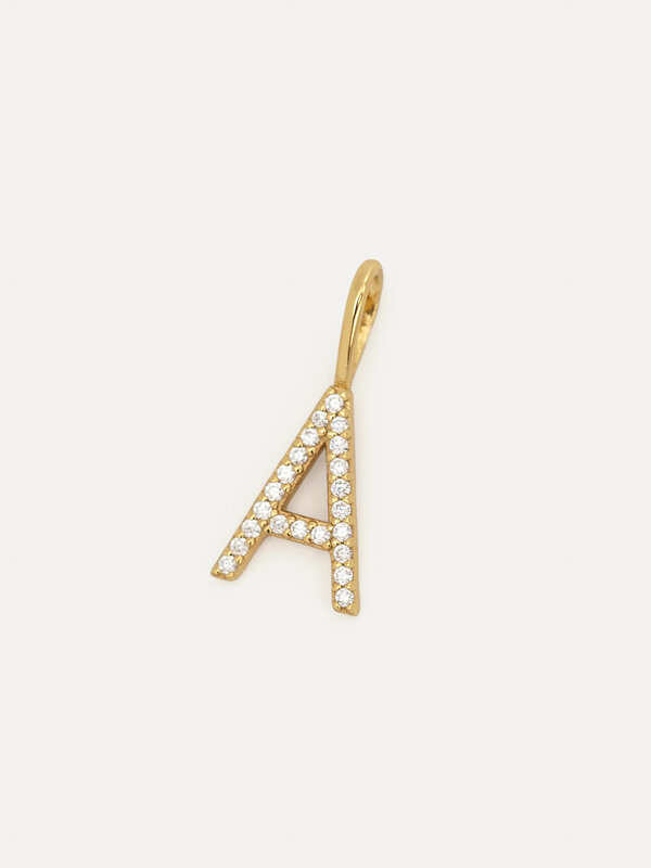 Les Soeurs Charm Initial Strass 1. Personalize your look with this charm, a subtly gilded letter form in 14-karat gold. N...