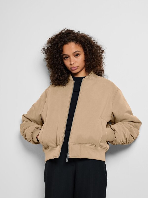 Selected Bomber jacket Netra 5. Discover the laid-back city vibes with this bomber. This jacket with ribbed collar, dropp...