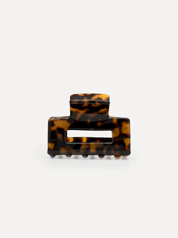 Les Soeurs Resin hair Clip Rectangle 1. This rectangular hairpin with a dark tortoise pattern offers a reliable grip, per...