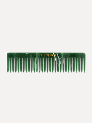 Hair comb. Upgrade your hair care routine with this green comb, crafted from resin for a luxurious touch. This handy acce...