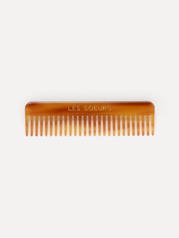 Les Soeurs Resin hair comb 1. Upgrade your accessory collection with this small comb, designed to conveniently fit in you...
