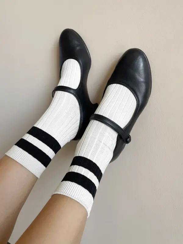 Le Bon Shoppe Socks Her Varsity 4. These socks are a striped version of the original Her socks that are classically ribbe...