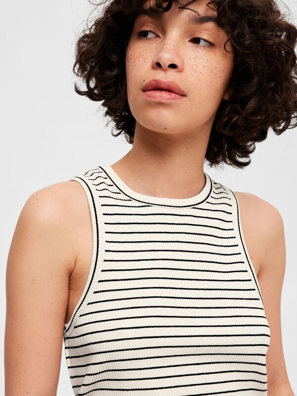 Selected Striped tank top Anna 3. Keep it simple with this ribbed tank top. It comes in a sleeveless design with a round ...