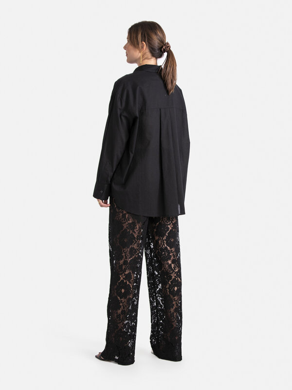 Les Soeurs Lace trousers Reva 7. Embrace timeless elegance and refinement with this beautiful black lace pants. This vers...