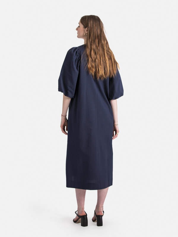 Les Soeurs Seersucker dress Paulie 6. Step confidently into spring with this stunning blue dress, a perfect blend of styl...