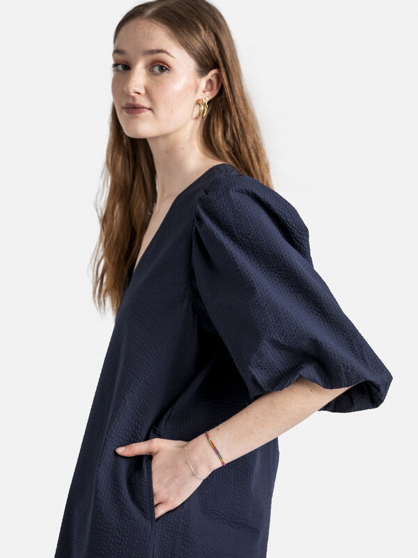 Les Soeurs Seersucker dress Paulie 7. Step confidently into spring with this stunning blue dress, a perfect blend of styl...