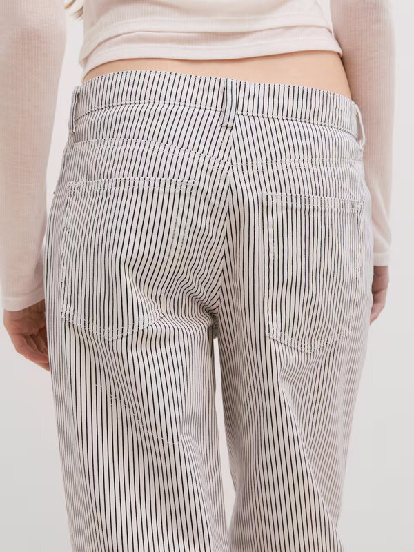 Edited Striped denim Liv 6. Create a unique look in these jeans, which offer a playful and trendy vibe with their striped...