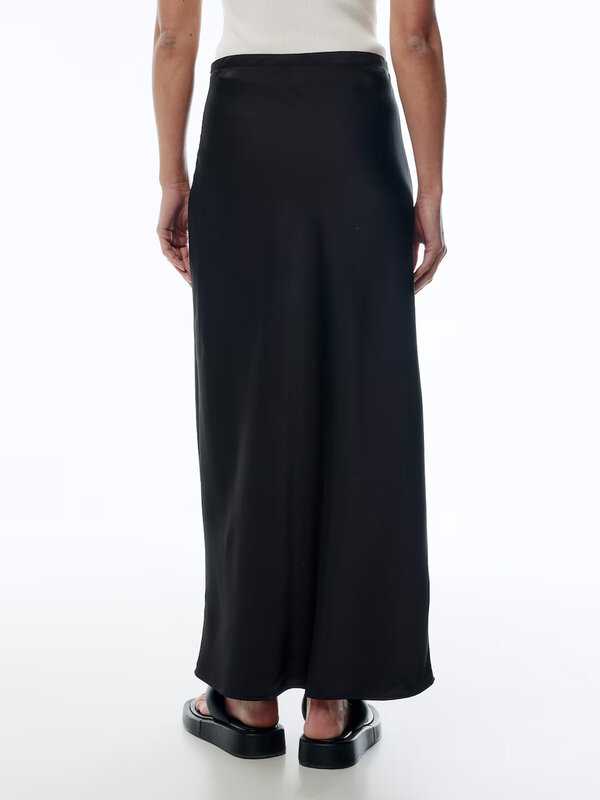 Edited Satin skirt Silva 5. Embrace timeless elegance with this black satin midi skirt, where the satin fabric provides a...