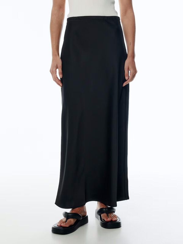 Edited Satin skirt Silva 3. Embrace timeless elegance with this black satin midi skirt, where the satin fabric provides a...