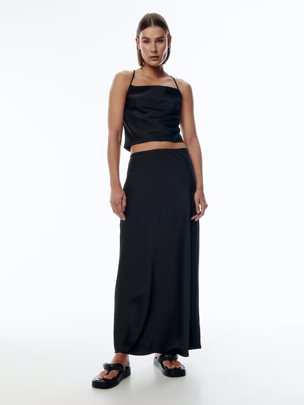 Edited Satin skirt Silva 2. Embrace timeless elegance with this black satin midi skirt, where the satin fabric provides a...