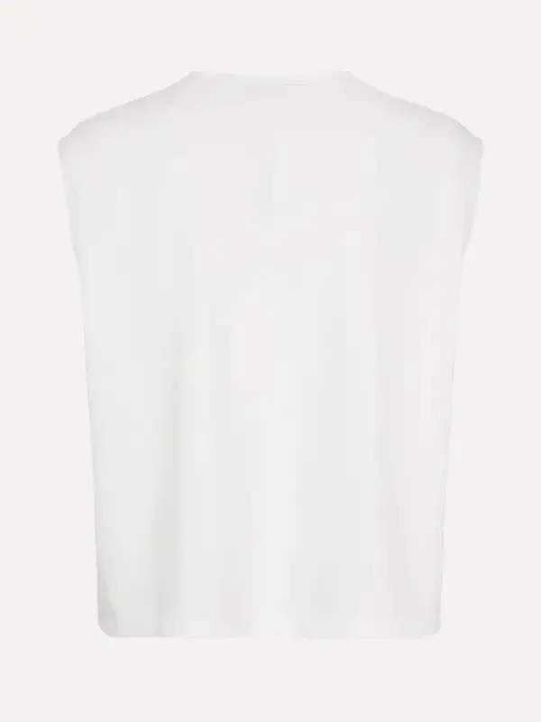 MBYM Top Monterio Bosko 5. Embrace comfort and refinement with our loose-fitting short sleeve top in bright white. An ess...