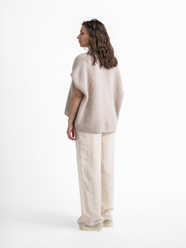 Edited Trousers Marthe 5. Embrace summer style with these linen paperbag trousers featuring wide legs, perfect for an air...