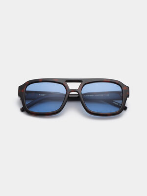 Sunglasses Kaya. Everyone needs a KAYA. This unisex piece is an oversized pilot frame inspired by the 70s. The blue lense...