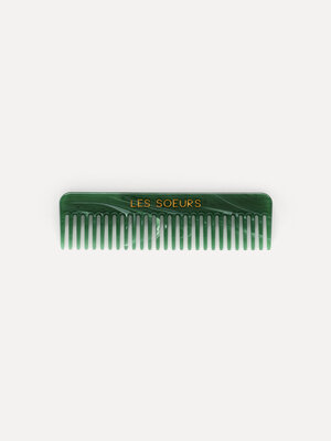 Hair comb. Upgrade your accessory collection with this small comb, designed to conveniently fit in your handbag for quick...