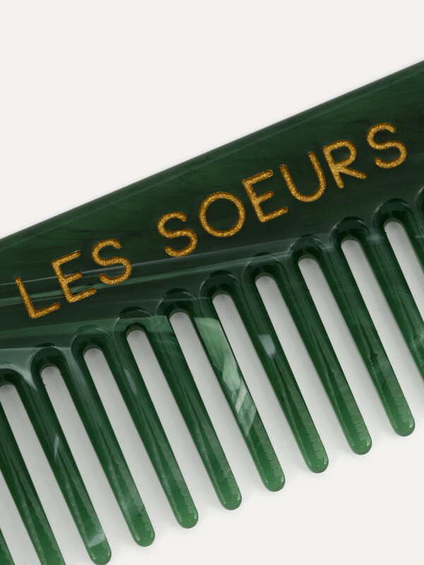 Les Soeurs Resin hair comb 2. Upgrade your accessory collection with this small comb, designed to conveniently fit in you...