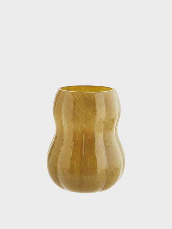 Madam Stoltz Vase 1. Let your flowers shine in this stunning vase with a warm honey color. The organic shape adds a natur...