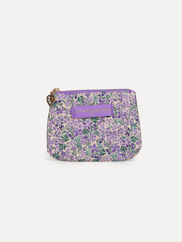 Le Marais Toiletry bag Iza 1. Give your daily routine a colorful upgrade with this small pouch featuring a playful purple...