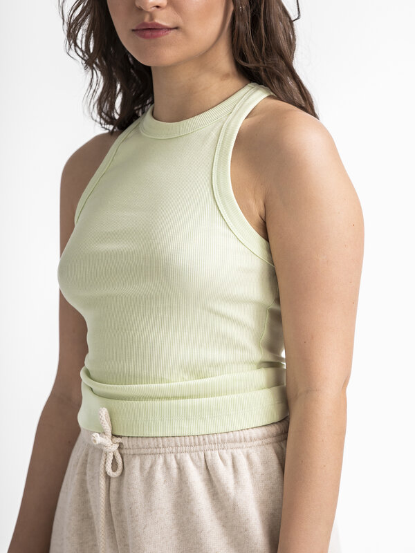 Edited Tanktop Orelia 4. Embrace the summer vibes with this ribbed tank top in a fresh pastel green color, instantly givi...