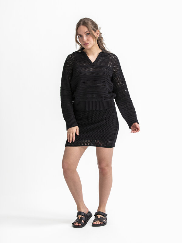 Selected Crochet pull Fina 3. This black crocheted sweater offers a relaxed fit for an effortlessly comfortable feel. The...