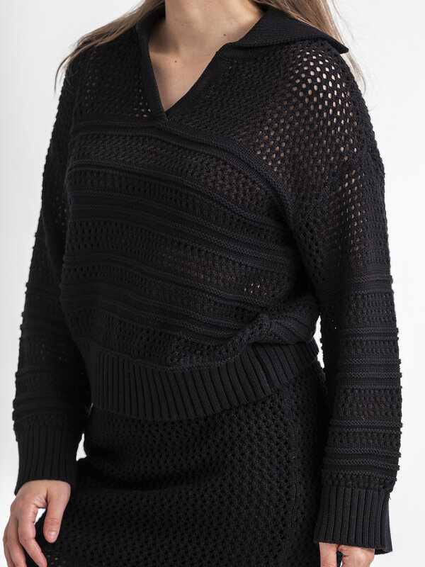 Selected Crochet pull Fina 4. This black crocheted sweater offers a relaxed fit for an effortlessly comfortable feel. The...