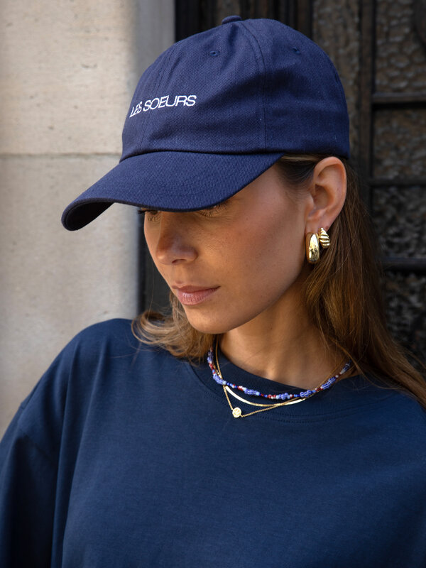 Les Soeurs Cap Poppy Les Soeurs 1. The 'Les Soeurs' cap is the perfect addition to your outfit, whether you're seeking so...