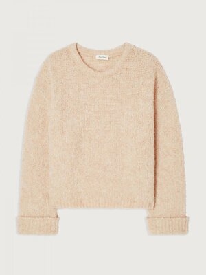 Knitted Jumper Zolly. Add a trendy touch to your outfit with this beige wool sweater. Long sleeves, dropped shoulders, an...