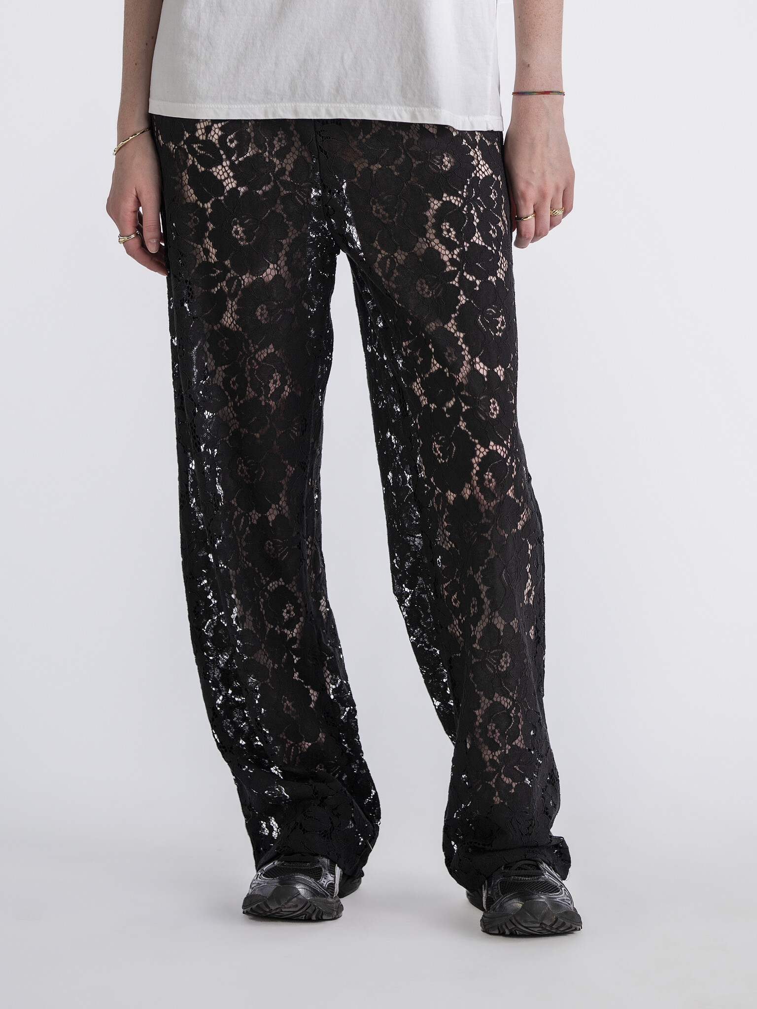 Les Soeurs Lace trousers Reva 1. Embrace timeless elegance and refinement with this beautiful black lace pants. This vers...