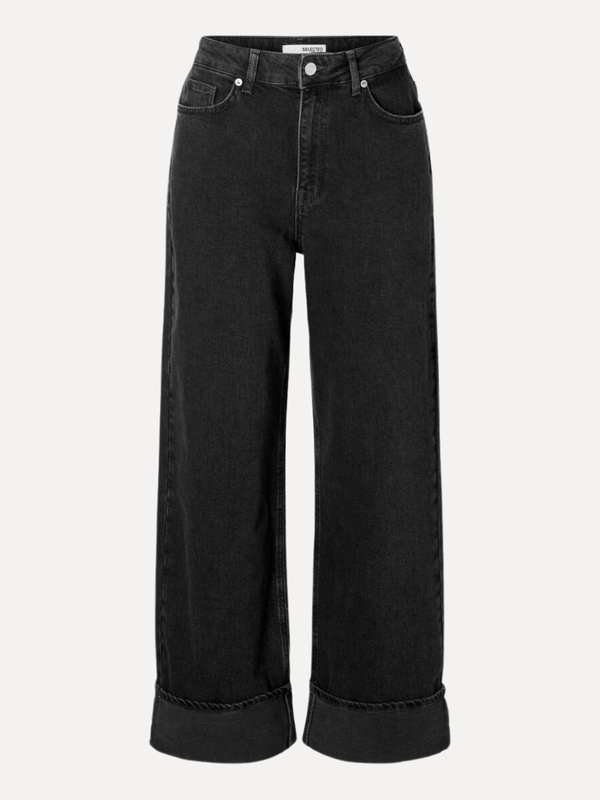 Selected Jean large Roby 7. Ce jean noir est une ode aux années 90. La taille haute et les jambes larges insufflent des v...