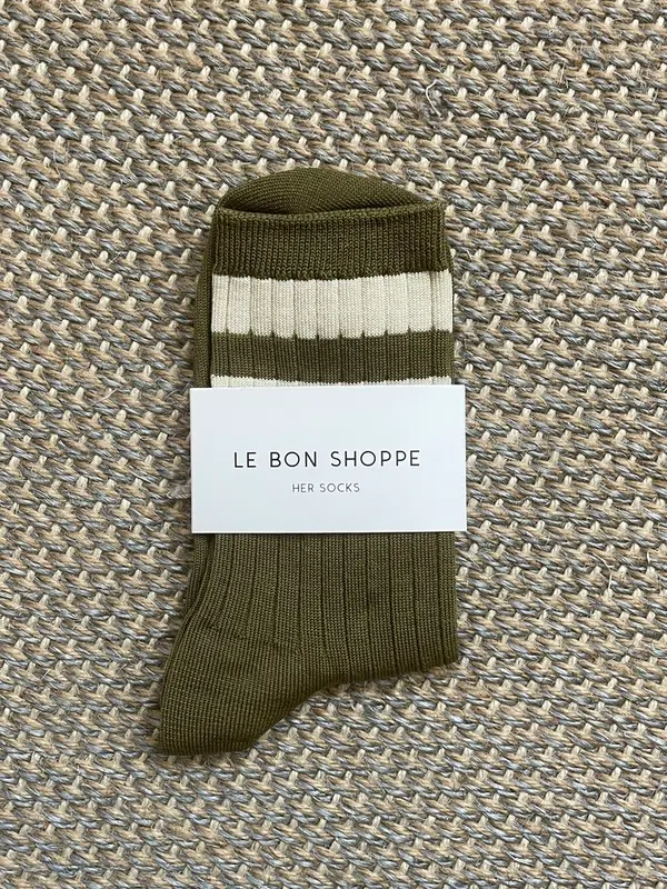 Le Bon Shoppe Socks Her Varsity 5. Feet up with this colorful pair of socks! The contrasting white stripes and ribbed tex...