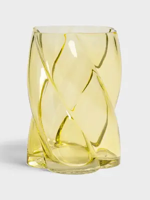 Vase Marshmallow. Clever design in yellow glass. The rotating shape creates beautiful light effects on your table or wind...