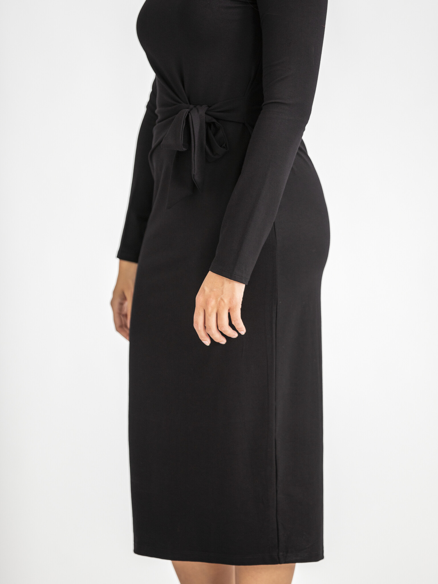 Edited Tied dress Beate 4. Meet the little black dress 2.0. This midi dress with subtle button waist exudes effortless lu...