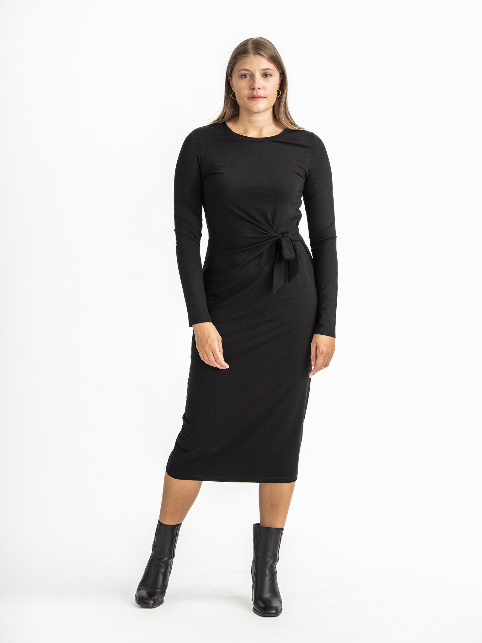 Edited Tied dress Beate 1. Meet the little black dress 2.0. This midi dress with subtle button waist exudes effortless lu...