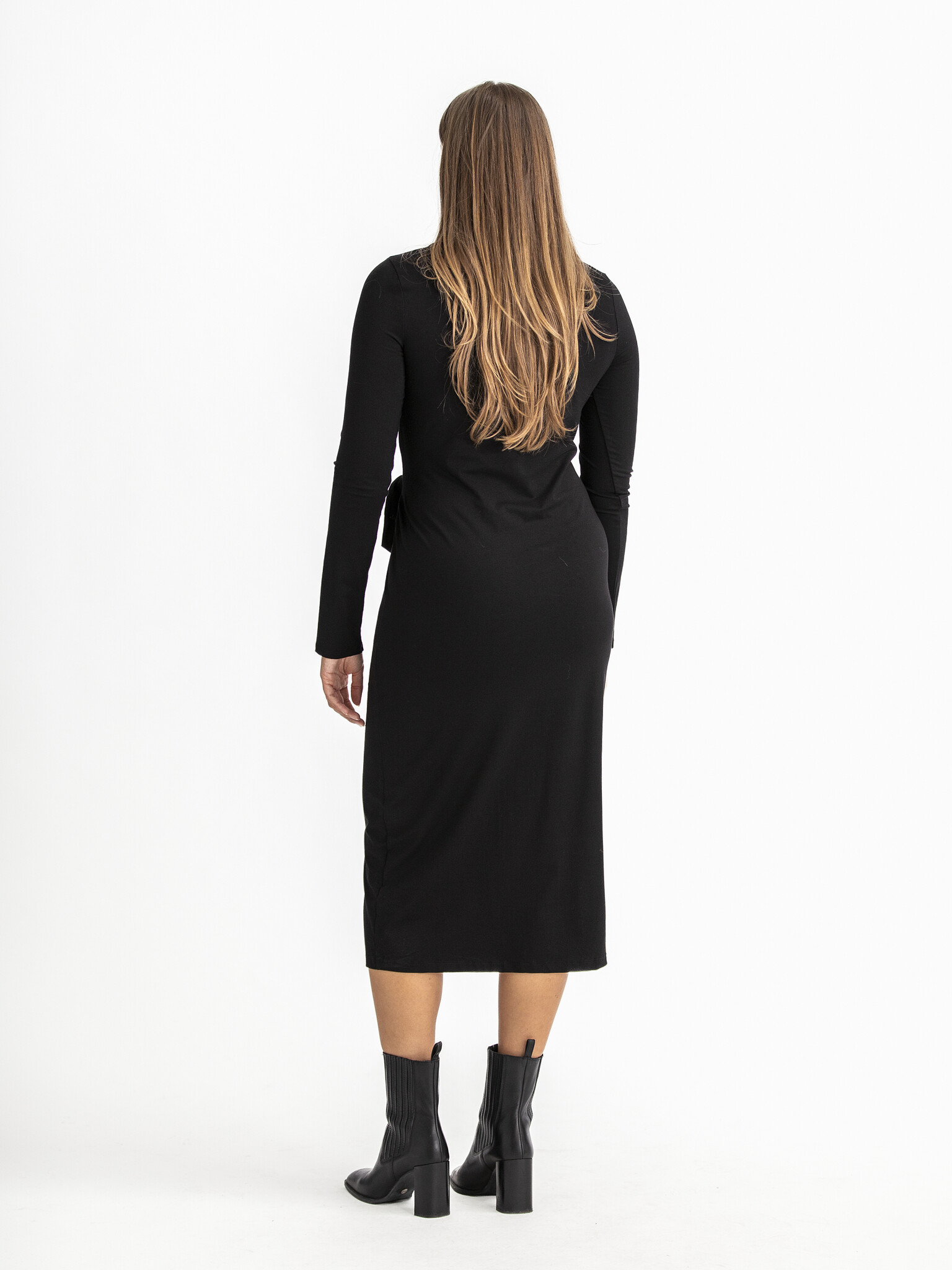 Edited Tied dress Beate 5. Meet the little black dress 2.0. This midi dress with subtle button waist exudes effortless lu...