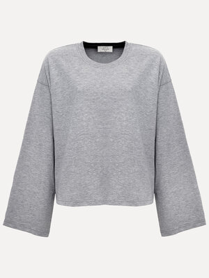 T-shirt à manches longues Aline. Pas envie de stress de choix? Ce t-shirt basique boxy complète n'importe quelle tenue. L...