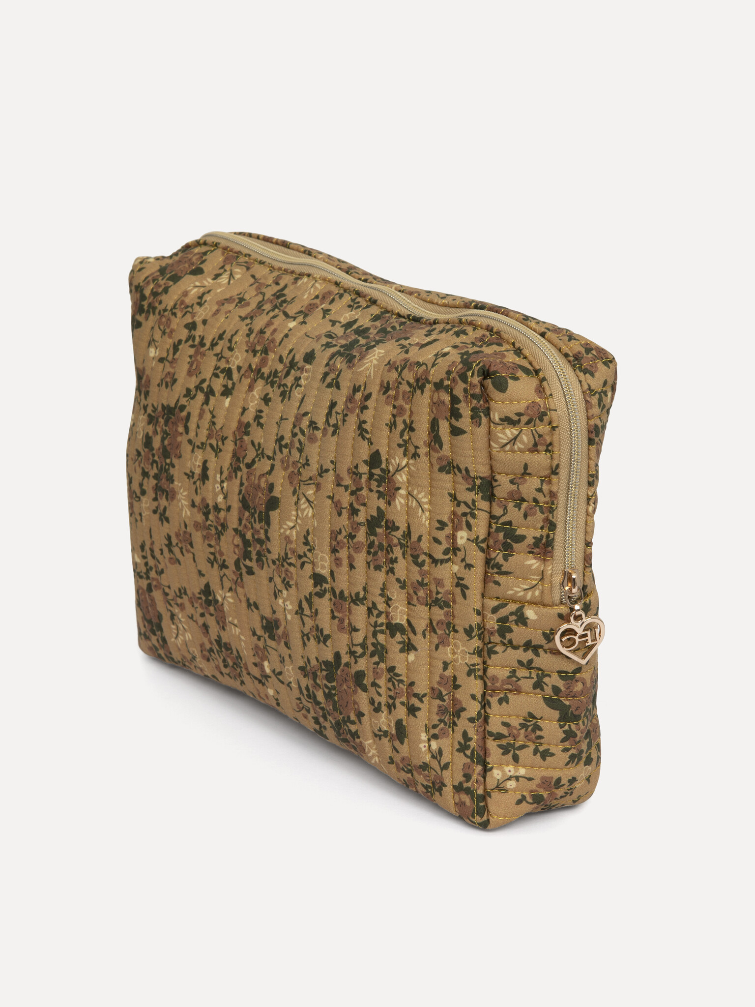Le Marais Gebloemde toilettas Iza 2. Een toilettas voor de maximalist: deze okergele XL-pouch met botanische print biedt ...