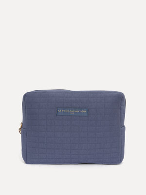 Toiletry bag Iza. Spacious, practical and chic! This XL toiletry bag in denim blue is the ultimate organizer for long vac...