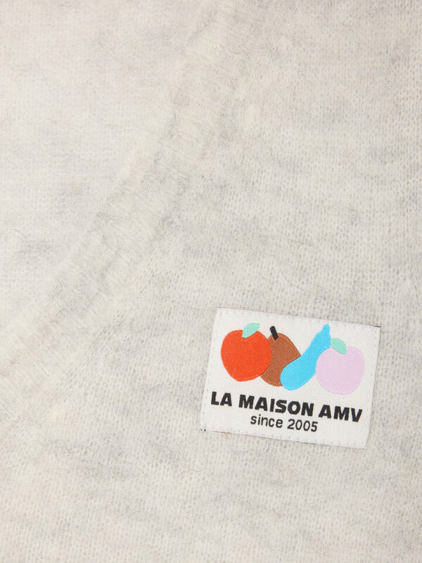 American Vintage Mouwloze Pull Nenybay 6. Geen mouwen, wél wolkzacht: dit gebreide vest met logopatch en luchtige V-hals ...
