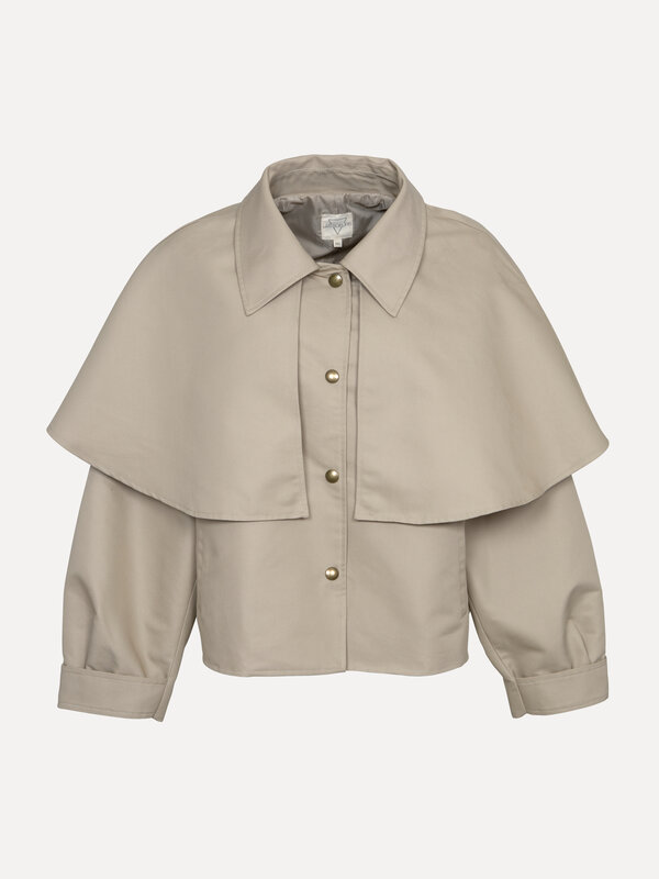 Les Soeurs Jas met cape Jessica 2. Zin in iets nieuws zonder je geliefde trenchcoat te verruilen? Dit model met cape bren...