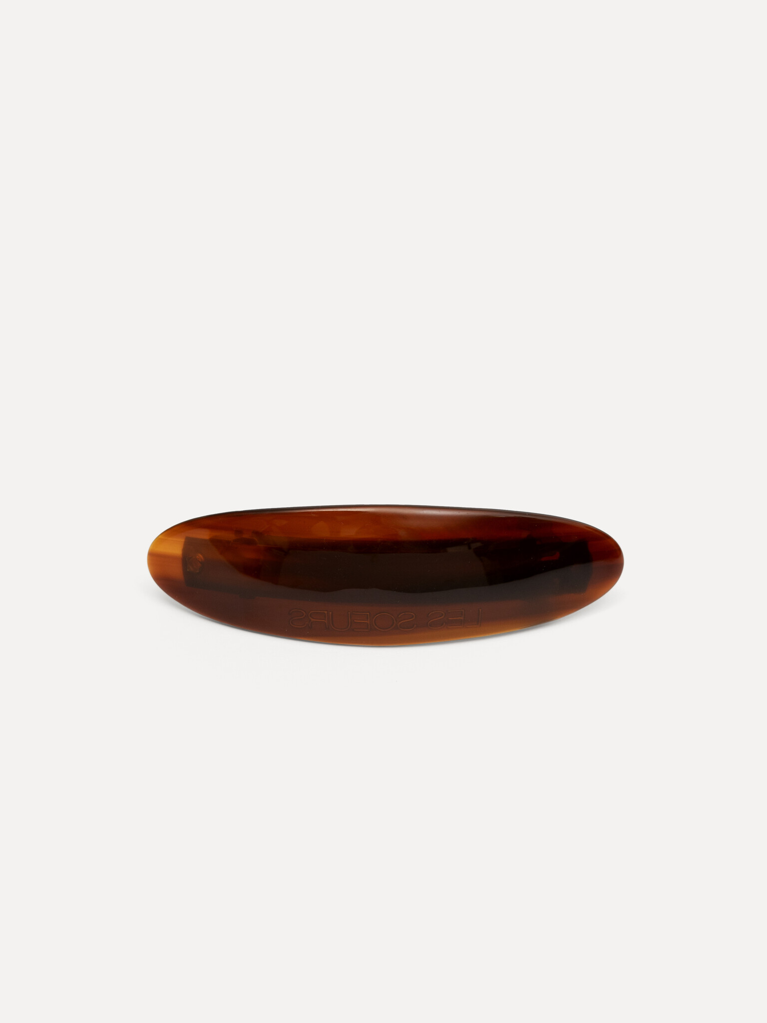 Les Soeurs Barrette à cheveux ovale résine 1. Pluie, vent ou paresse? Cette barrette dans une teinte brune chaleureuse ma...