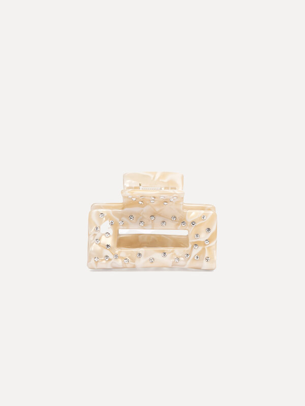 Les Soeurs Pince à cheveux en résine rectangle strass 1. Une épingle à cheveux qui est aussi un bijou? Grâce à sa brillan...
