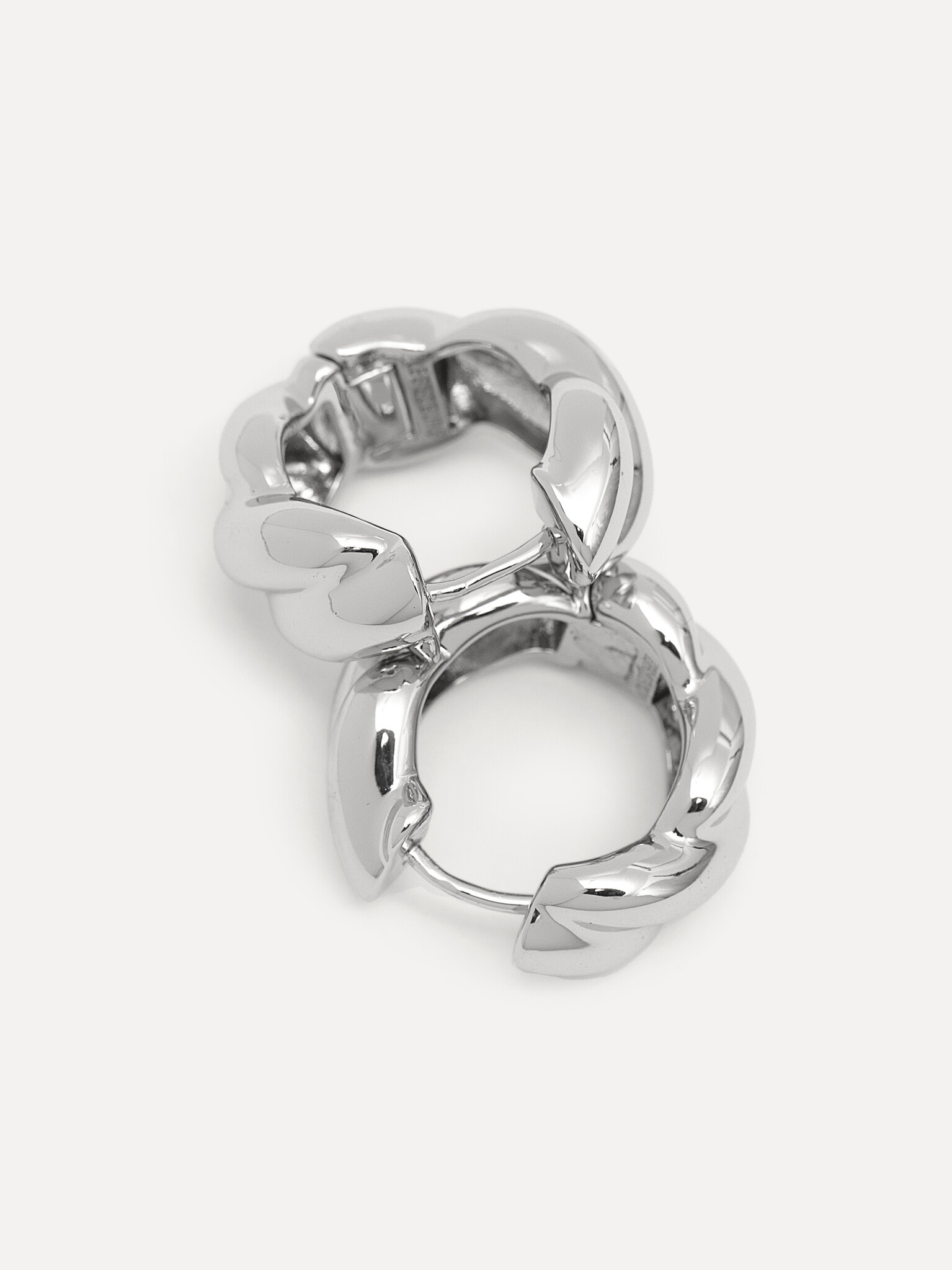 Les Soeurs Earrings set Fara Loomed 3. Knot your average earrings! These silver creoles are the perfect balance between s...