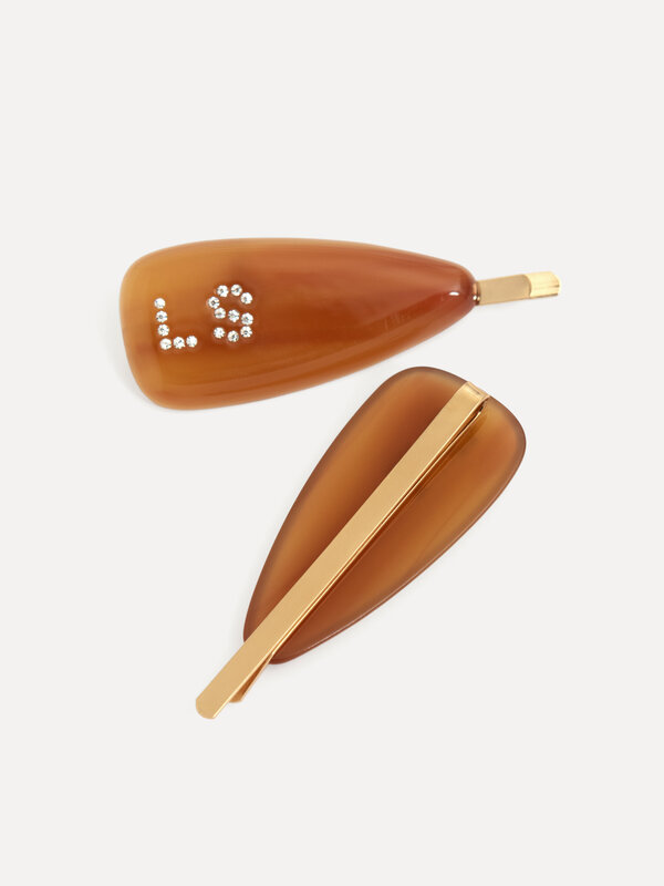 Les Soeurs Haarschuivers set resin Les Soeurs 3. Beautyhack alert! Gebruik deze haarschuivers om je lokken elegant uit je...