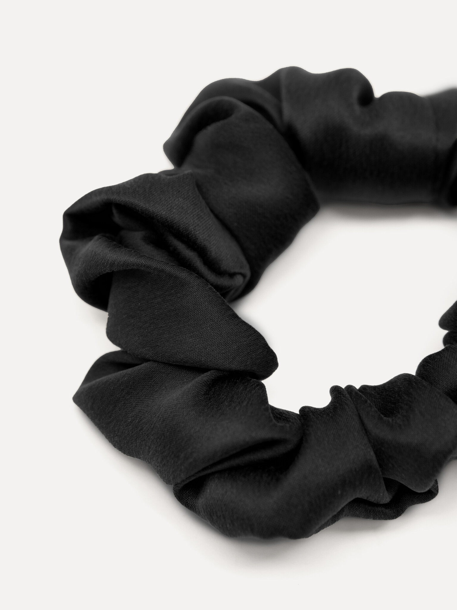 Les Soeurs Silk scrunchie 2. Luxury for your locks! This large black scrunchie keeps your hair smooth and frizz-free, eve...
