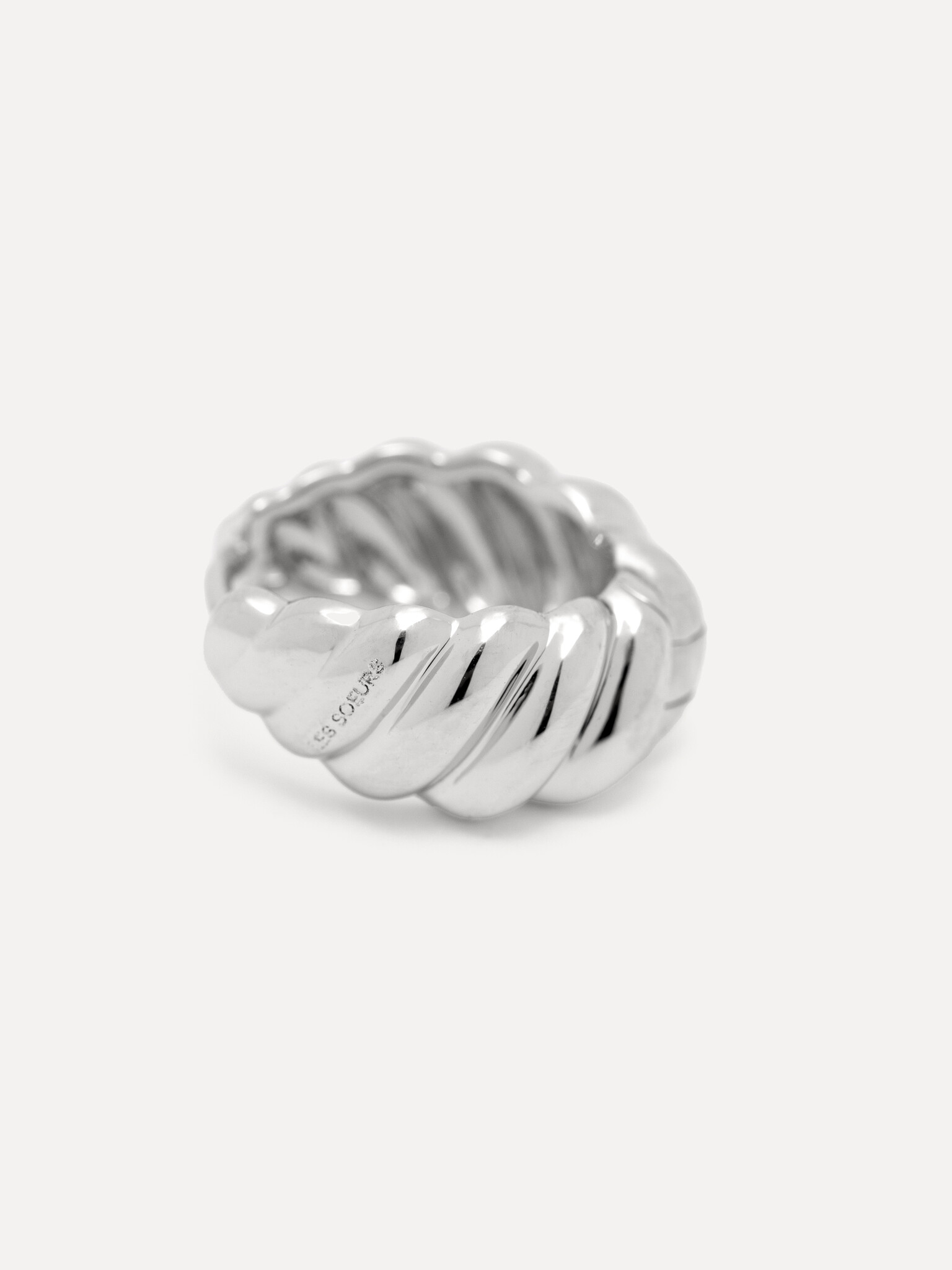 Les Soeurs Earring Jazz Croissant 1. Parisian chic! This croissant earring in silver combines elegant curves with a luxur...